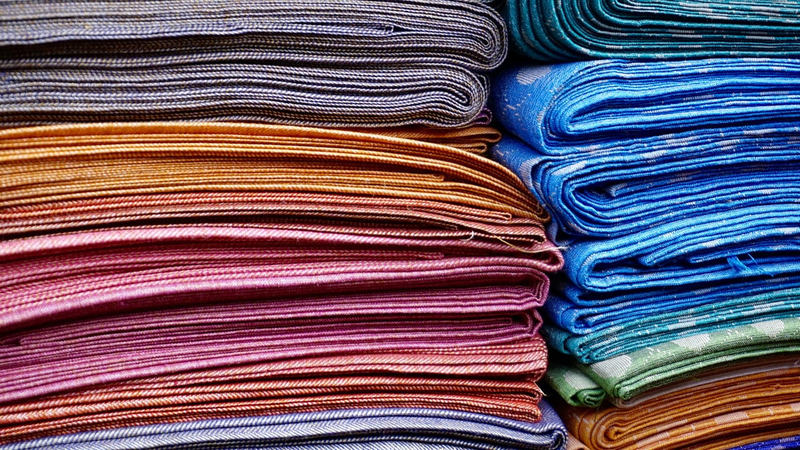 A collection of colored cloth - Photo by Digital Buggu from Pexels